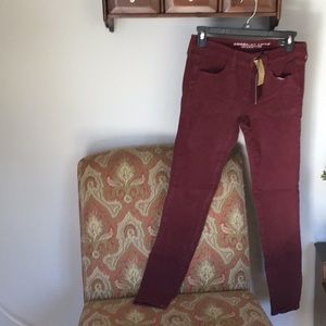 American Eagle twill super stretch maroon colored jeans